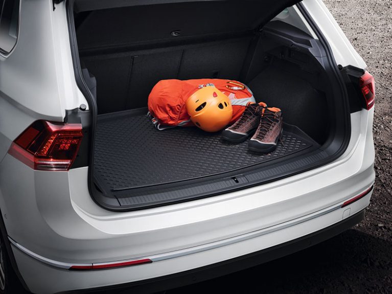 Open trunk with mat, climbing equipment on it